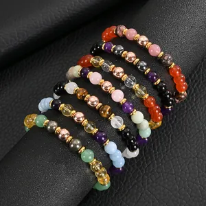 Detailed view of assorted 8mm natural stone beaded bracelets for anxiety and stress relief