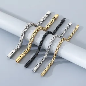 Street style Byzantine chain bracelets in gold, black, and silver stainless steel.
