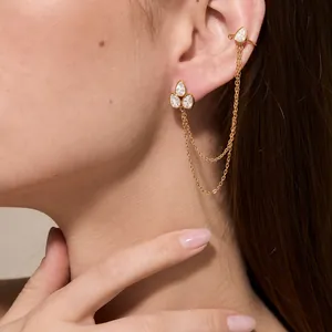 Detailed view of 18K gold-plated teardrop zircon stud and ear cuff integrated tassel earring