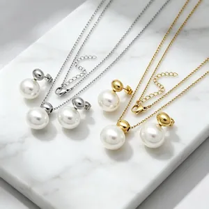 Detailed view of stainless steel shell bead necklace and earring sets in gold and silver