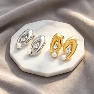 Boucles d'oreilles élégantes œil du diable avec perles et cristaux en or et argent
