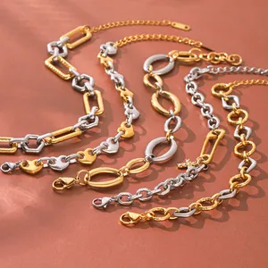Detailed view of two-tone stainless steel bracelets with geometric and heart links.