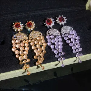 Luxury 18k gold plated grape cluster earrings with red zircon and tassels