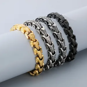 Close-up of four interlocking dragon-bone bracelets in gold, silver, and black finishes.