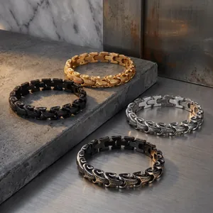 Detailed view of four dragon bone men's bracelets in gold, black, and silver finishes