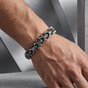 Close-up detail of men's vintage stainless steel dragon bone chain bracelet in punk style