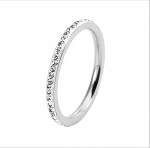 Close-up detail showing the sparkling micro-pave zircons on a silver stainless steel ring