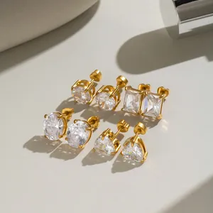Detailed view of 18K gold-plated stainless steel stud earrings with varied CZ shapes
