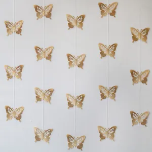 Elegant shimmering gold 3D butterfly paper garland for birthday party room decor