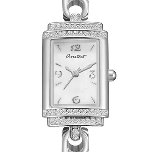 Close-up of silver rectangular women's watch dial with rhinestone accents and Ourstart logo.