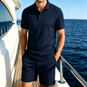 Premium navy blue mesh ice silk polo shirt and shorts set for men on a yacht