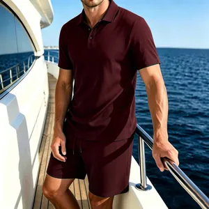Close-up detail of men's burgundy mesh ice silk polo shirt and shorts set on a luxury yacht