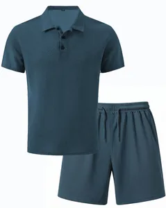 Detail view of men's teal waffle knit mesh polo shirt and matching drawstring shorts set