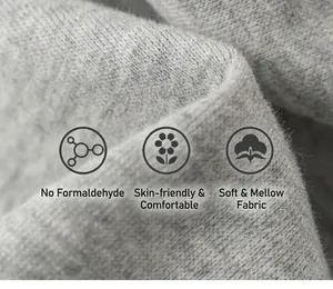 Vue détaillée de la texture douce en coton gris respirant pour pantalons d'enfants