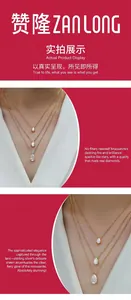 Detailed view of layered 925 silver necklaces with sparkling pear moissanite pendants