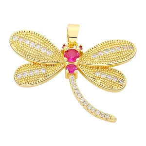 Elegant gold dragonfly pendant with red and white cubic zirconia for DIY jewelry making.