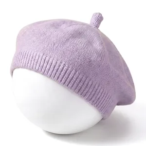 Detailed macro view of the soft knitted lavender beret for infants and babies