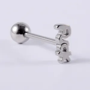 Macro detail of a silver stainless steel tongue ring stud featuring a bold FUCK word design