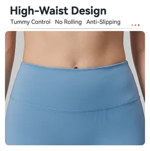 Detail showing the high-waisted blue yoga shorts for tummy control and support
