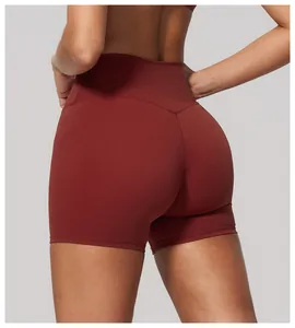 Back detail of high-waisted red yoga shorts showing seamless fit and peach lift