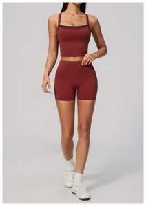 Close-up of high-waisted quick-dry yoga shorts in terracotta red for fitness training