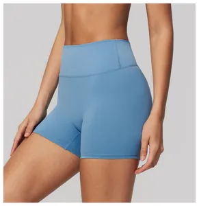 Close-up of high-waisted blue yoga shorts for women featuring quick-dry nude-feel fabric.
