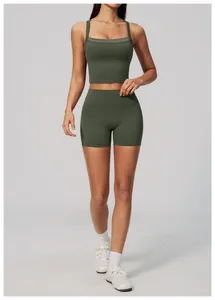 Close-up detail of women's olive green high-waisted yoga shorts with quick-dry naked feel fabric