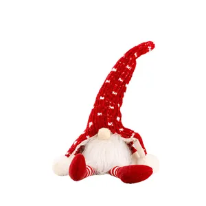 Festive Christmas plush gnome with long red knitted hat and white beard decoration