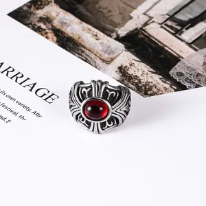 Vintage gothic punk titanium steel ring for men and women with red oval gemstone