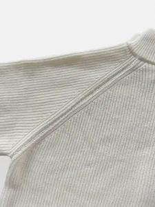 Detailed view of the premium ribbed knit texture on a men's stand collar sweater (82 chars)