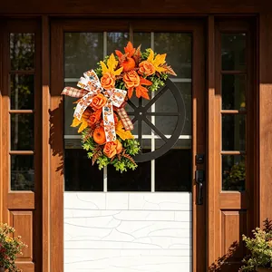 Cozy Autumn Thanksgiving wreath featuring wooden wheel, pumpkins and maple leaves on front door