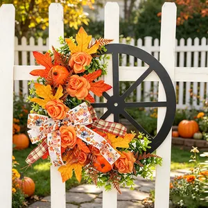 Autumn Thanksgiving wreath featuring a wooden wagon wheel and pumpkins for garden decor
