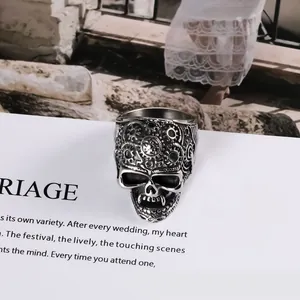 Punk style vintage vampire skull ring featuring steampunk gears made of durable titanium steel.
