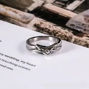 Vintage titanium steel ring with geometric star design in gunmetal finish