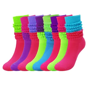 Unisex neon contrast color slouch socks in mid-calf length for a retro 80s look.