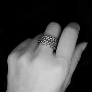 Vintage retro woven titanium steel ring for men in a bold punk style, black and white