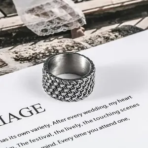Vintage woven titanium steel ring for men with a bold punk style and unique braided design