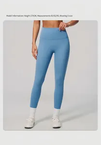 Close-up of high-waisted light blue yoga leggings showcasing a smooth, breathable fit