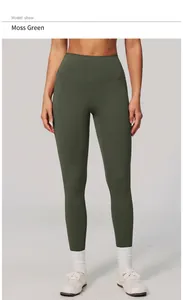 Front view detail of premium high-waisted moss green yoga leggings worn by a model