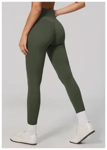 Close-up back view of dark green high-waisted yoga leggings with butt-lifting effect