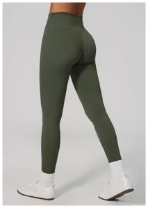 Detail view showing the back profile of dark olive high-waisted butt-lifting yoga pants