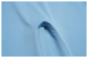 Macro detail of high waist yoga pants showing professional flatlock stitching seams