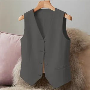 Detailed macro view of a grey V-neck women's suit vest with four button-down front design.