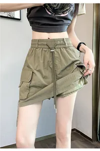 High-waisted olive green cargo skort with drawstring and side pockets for summer