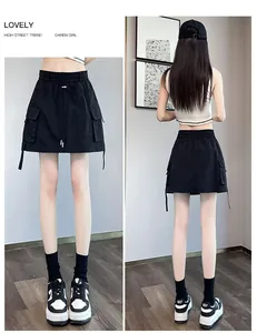 High waisted black cargo mini skirt for women with utility pockets and adjustable drawstring