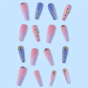 Elegant taro purple and pink gradient press-on nails with 3D floral accents and rhinestones.