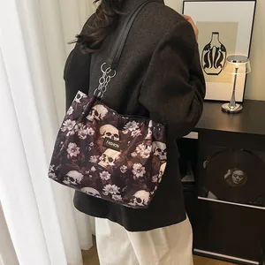 Edgy skull and floral print large capacity tote bag for women with chain shoulder strap