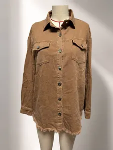 Washed brown denim shirt jacket for women featuring chest pockets and a unique frayed raw hem.