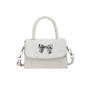 Elegant white bow handbag with silver star patterns, fashion crossbody shoulder bag