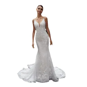 Elegant white mermaid wedding dress featuring floral lace embroidery and a small train.